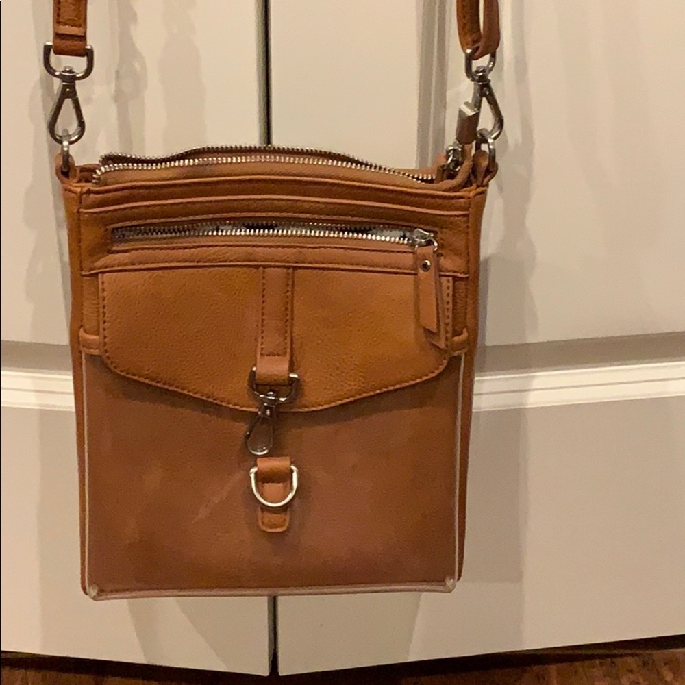 Brown cross body purse with clear front